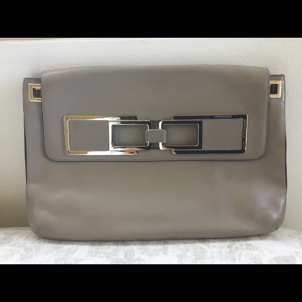 Anya hindmarch metal buckle clutch taupe tan